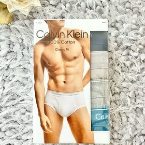 New with tags 4PK CALVIN KLEIN 100% COTTON CLASSIC FIT BRIEF. Greys, teal & navy